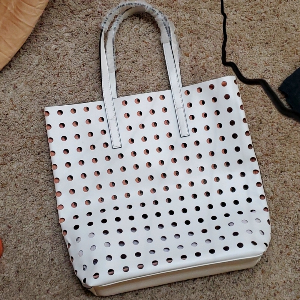 White Leather dot holed shopping bag..handles protected ,bottom of bag clean